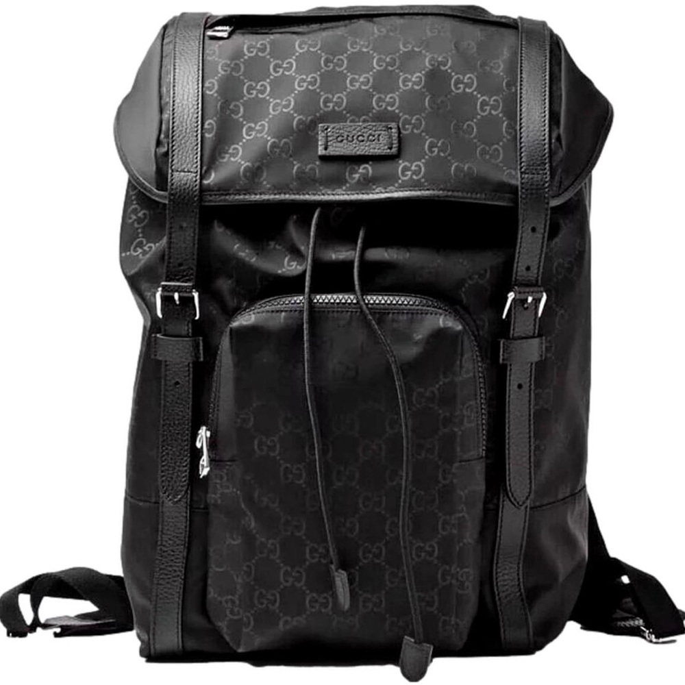 Authentic Gucci Nylon Monogram Medium Light Double Buckle Backpack in Black.